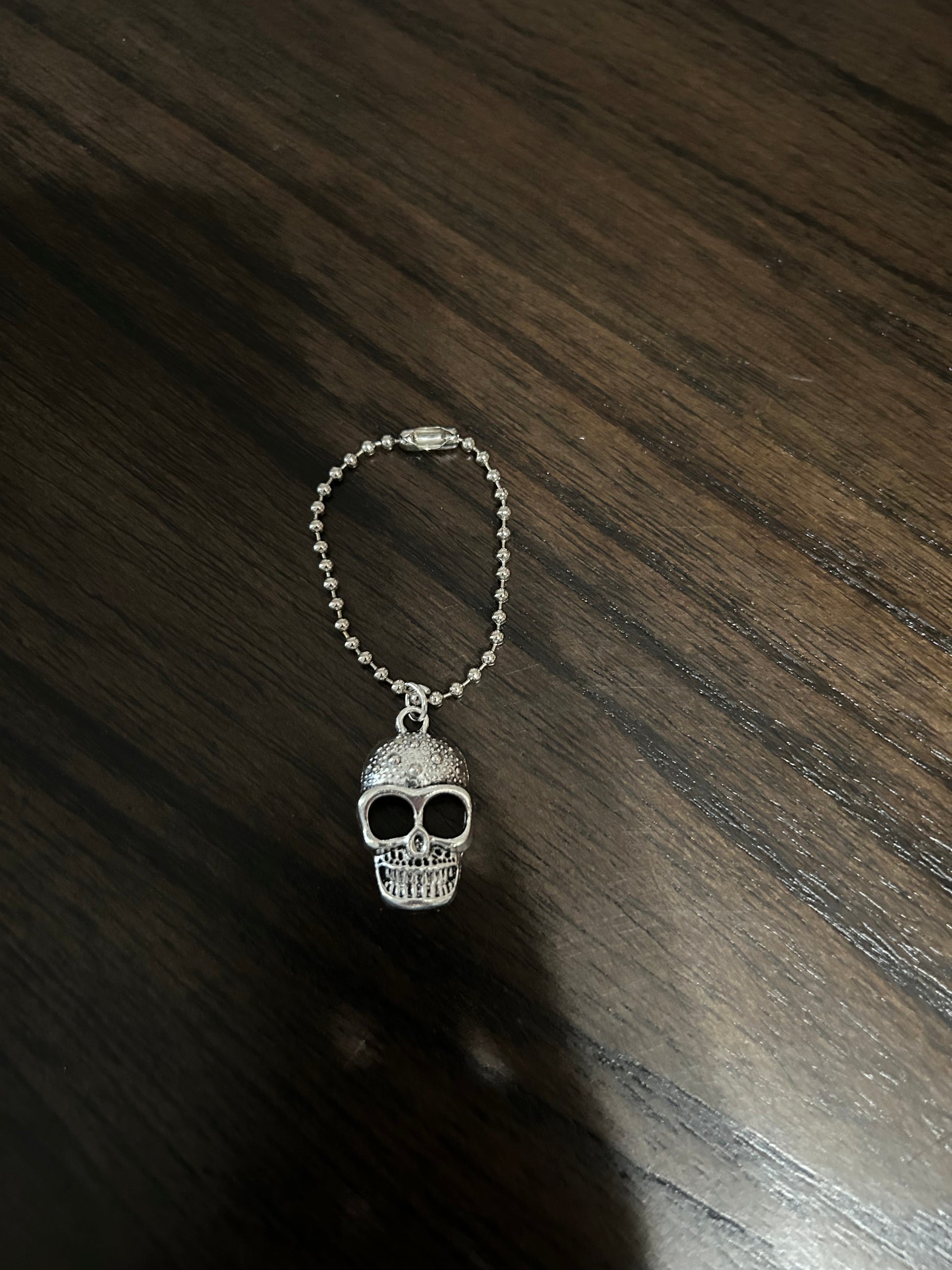Skull Handle Charm