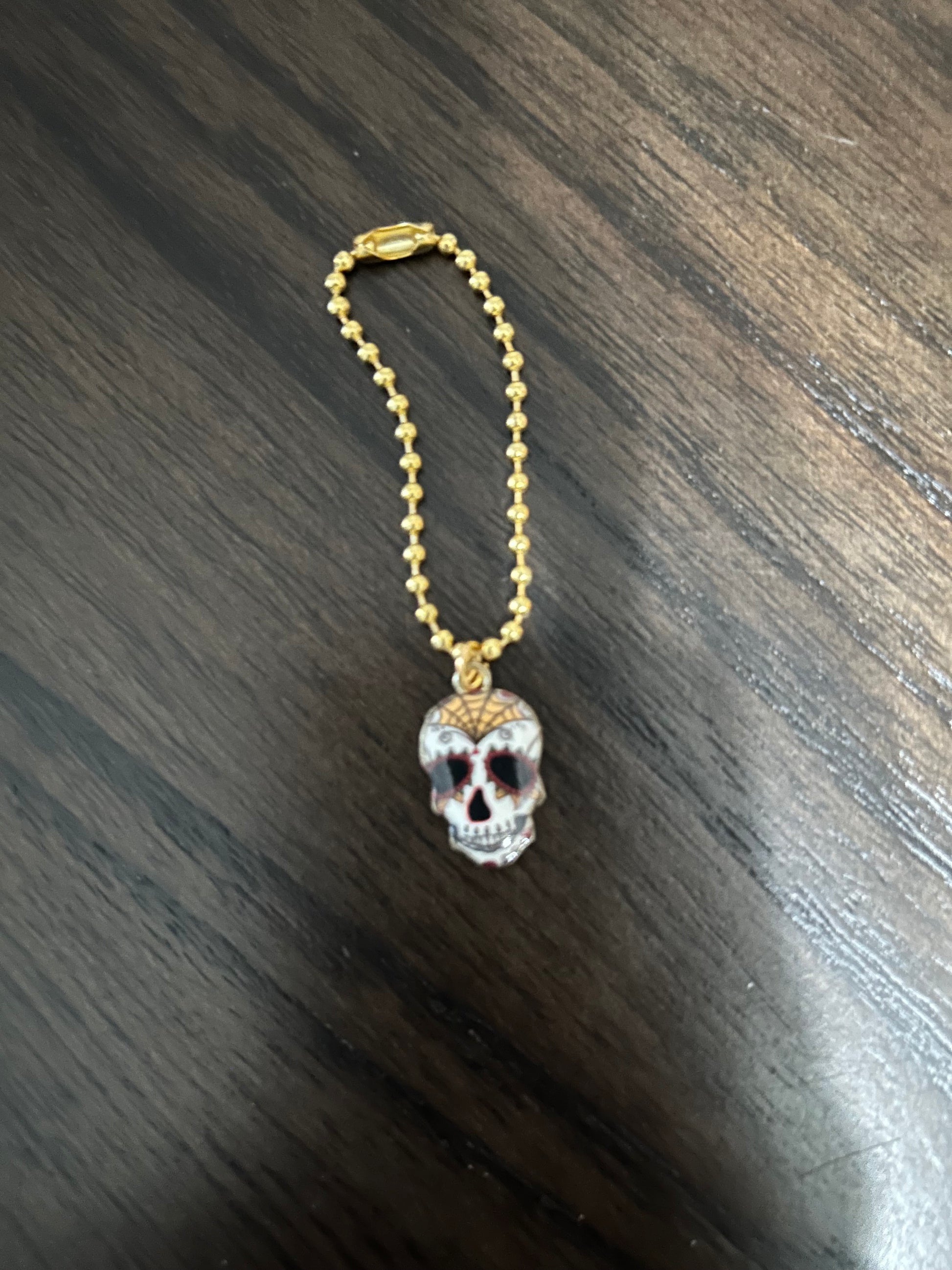 Skull Handle Charm