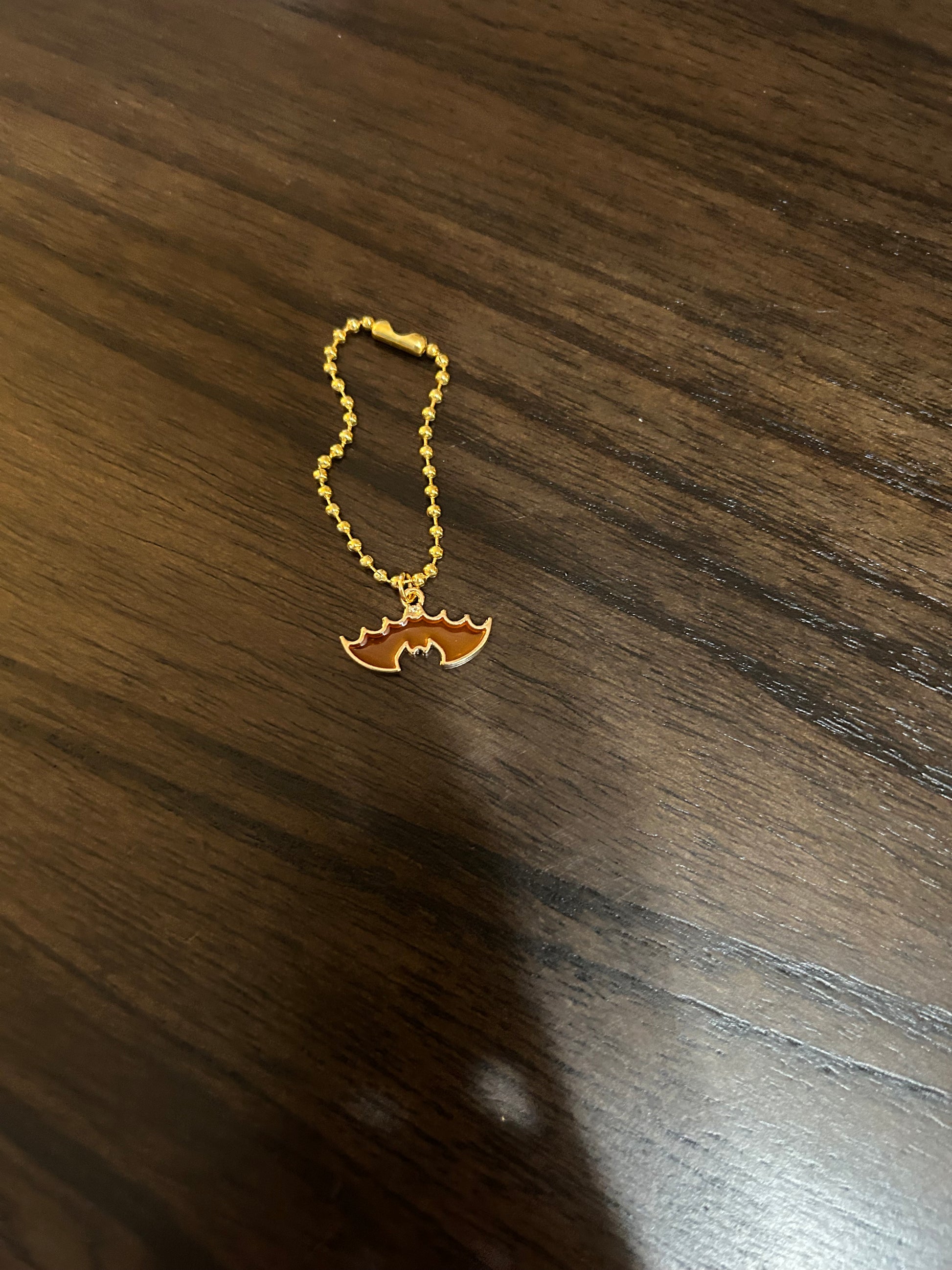 Orange Bat Handle Charm