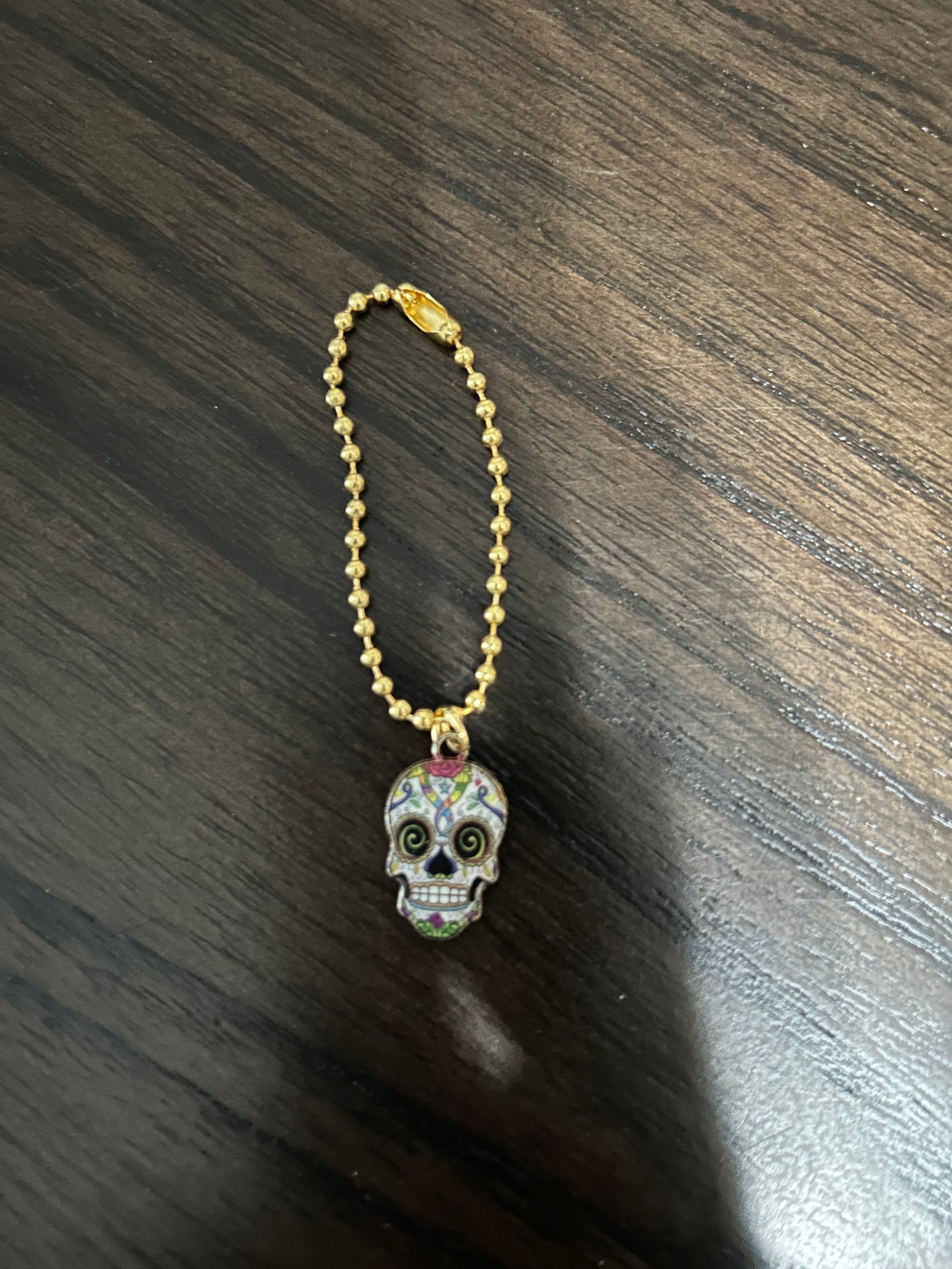 Skull Handle Charm