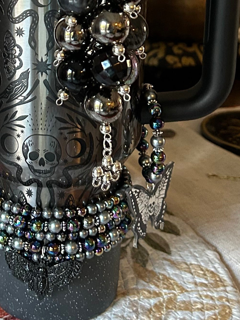 Deadly Demask Handle Charm