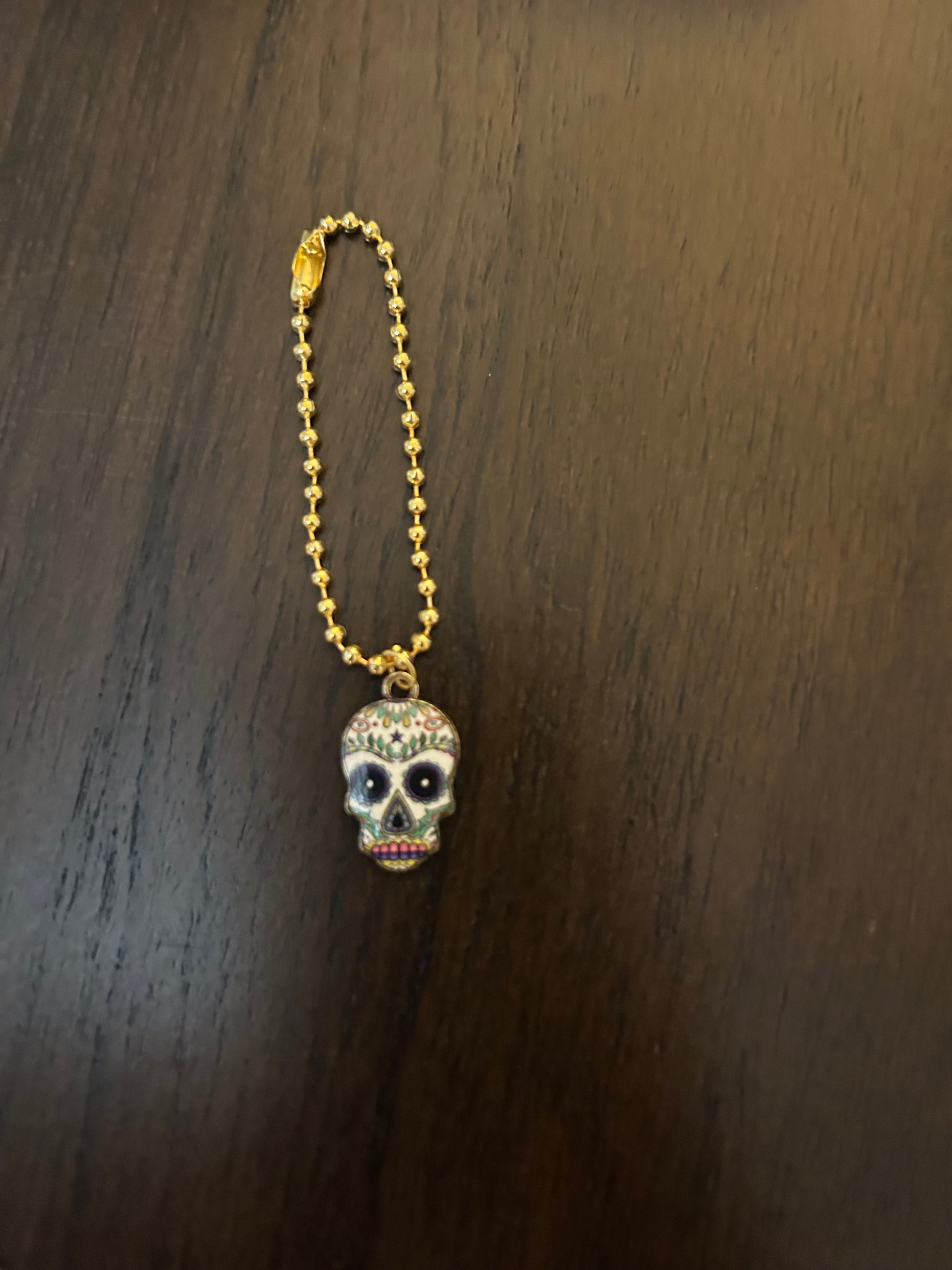 Skull Handle Charm