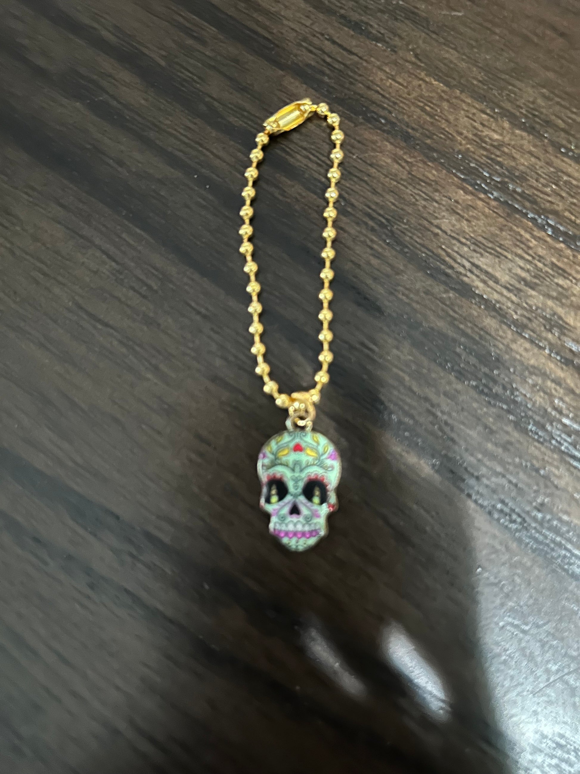 Skull Handle Charm