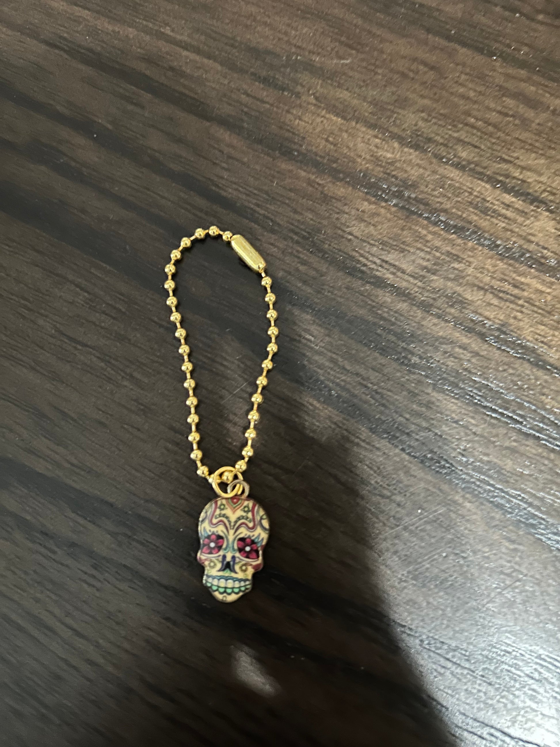 Skull Handle Charm