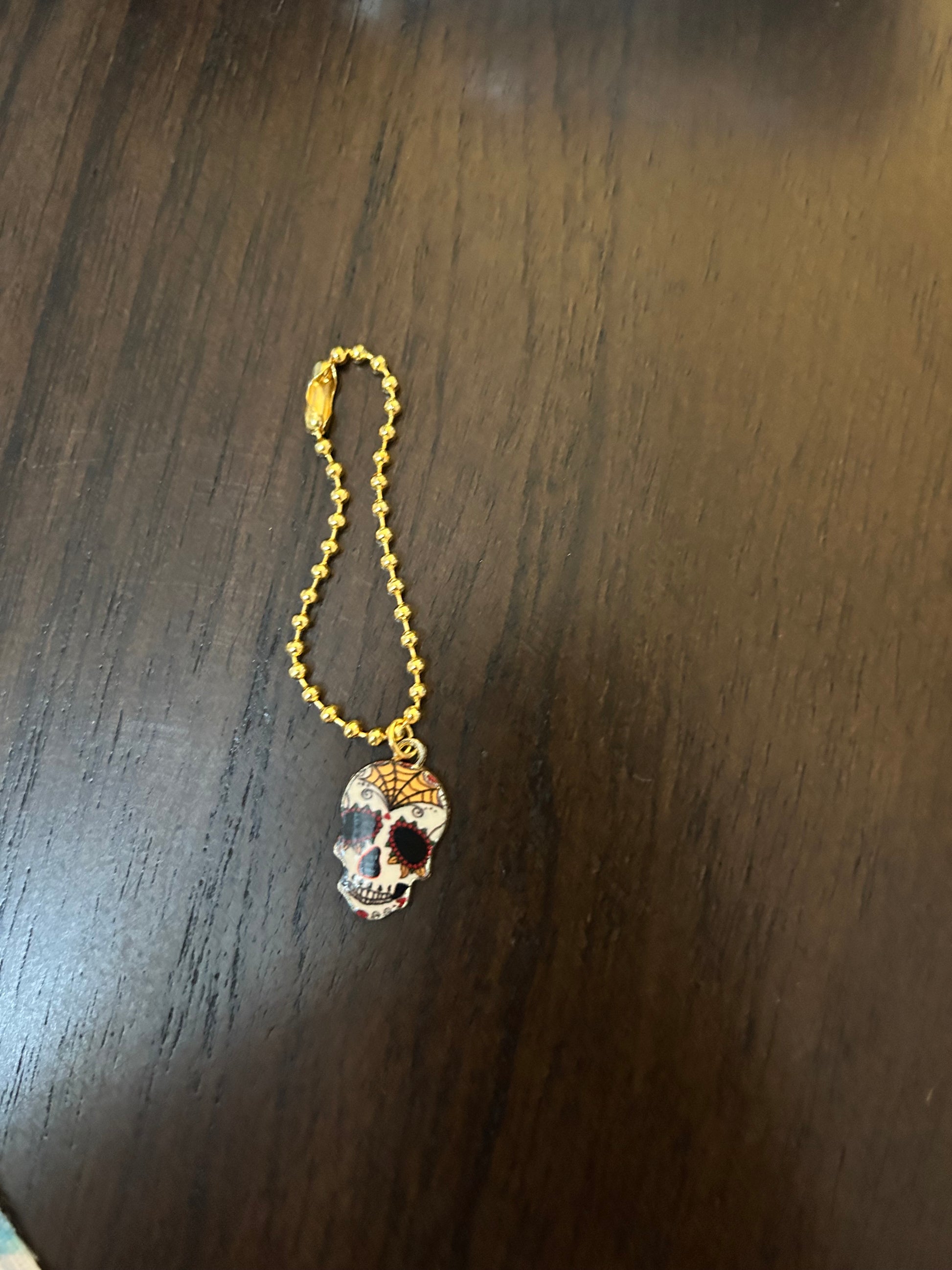 Skull Handle Charm